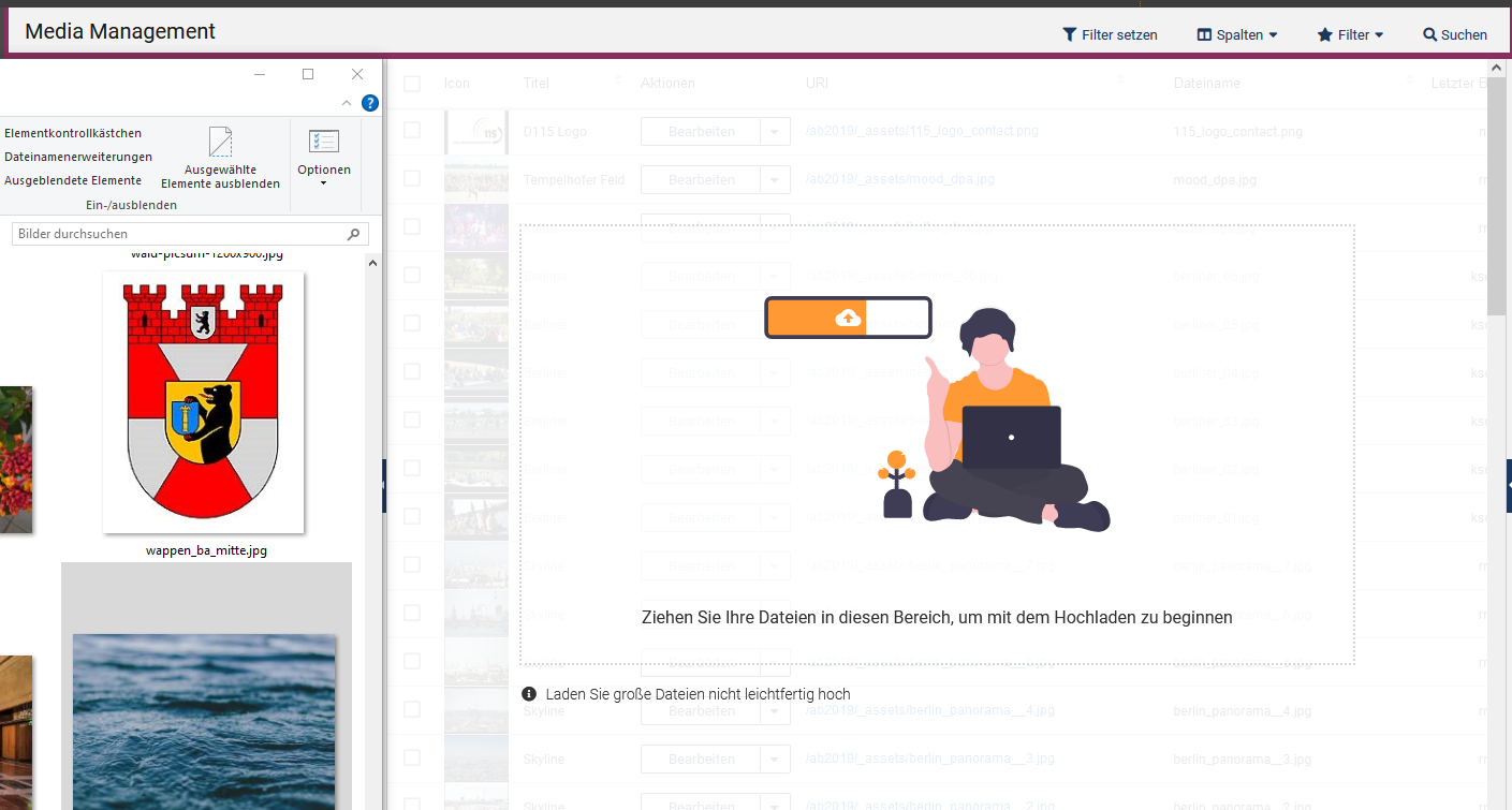 Links ist der Explorer zu sehen und rechts das MAM-Fenster. Beim Ziehen eines Assets in das MAM wird dort ein Hinweis angezeigt, dass man das Asset hierher ziehen kann, um es hochzuladen.